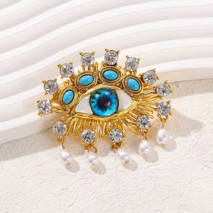 Pearly Eye Brooch